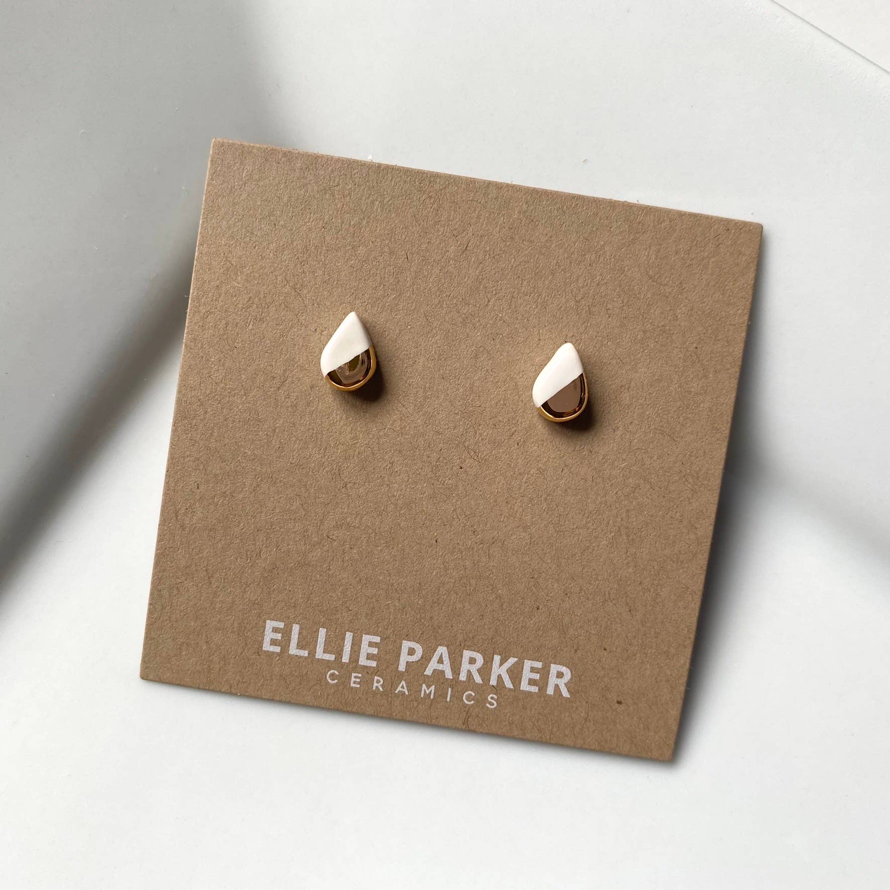 Teardrop White Ceramic Gold Accent Stud Earrings